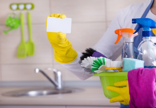 Cleaning supplies and tidy living space for regular cleaning