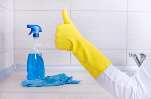 Detailed Airbnb cleaning checklist beside fresh linens and supplies