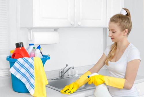 Cleaning a renovated kitchen during after builders cleaning service